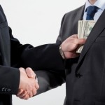 bribery in Muskogee